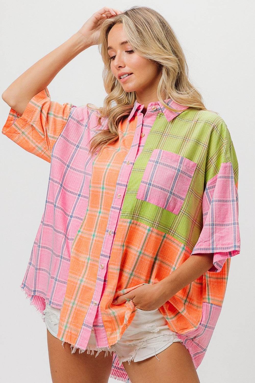 Plaid Collared Half Sleeve ShirtThe Plaid Collared Half Sleeve Shirt is a classic and timeless piece that combines the iconic plaid pattern with a smart collared neckline and trendy half sleeves. TButton-Up ShirtsPlaid Collared Half Sleeve Shirt