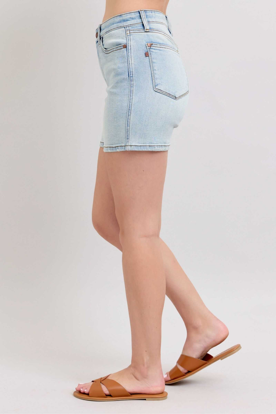 Judy Blue Two Button Denim ShortsThese 2-button denim shorts are a stylish addition to your wardrobe. They feature pockets for your convenience and added functionality. Made from durable denim fabriJean ShortsJudy Blue Two Button Denim Shorts