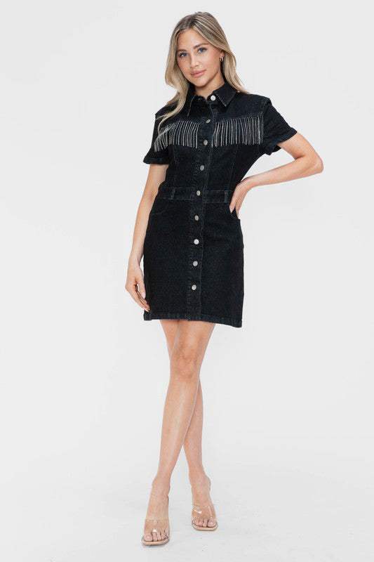 The Nashville Noir DressA little bit country, a little bit rock ‘n’ roll—the Nashville Noir Dress is where western edge meets modern glam. This sleek black denim shirt dress features a tailMini DressesNashville Noir Dress