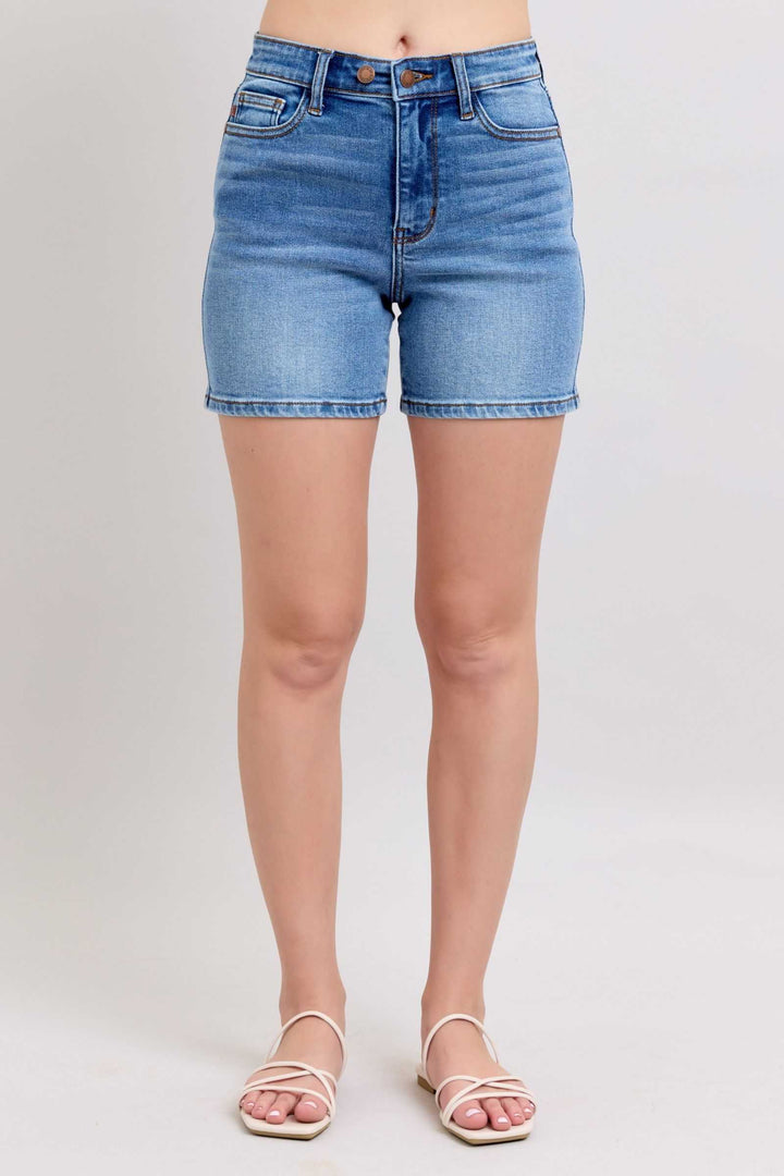 Judy Blue Two Button Denim ShortsElevate your casual look with our 2-button denim shorts featuring convenient pockets for on-the-go essentials. These shorts offer a stylish and comfortable fit, perfJean ShortsJudy Blue Two Button Denim Shorts