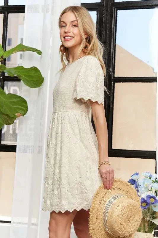 ADORA Rround Neck Crinkle Babydoll DressThe round neck crinkle babydoll dress is a charming and feminine option for any day. Its relaxed silhouette and crinkled texture add a playful touch to your outfit. ADORA Rround Neck