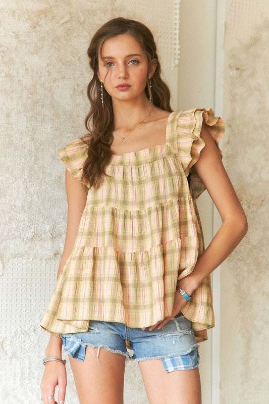 Sweet Prairie Ruffle TopLight as a summer breeze and full of vintage charm, the Sweet Prairie ruffle top brings effortless romance to any outfit. Crafted from soft, breathable cotton in a dShort Sleeve BlousesSweet Prairie Ruffle Top