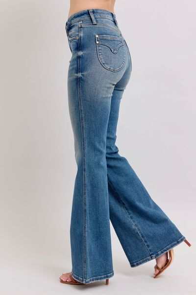 Judy Blue Flared Tummy Control Vintage Wash Flare JeansThese flared tummy control vintage wash jeans offer both style and functionality. The tummy control feature helps create a flattering and slimming silhouette. The viFlare JeansJudy Blue Flared Tummy Control