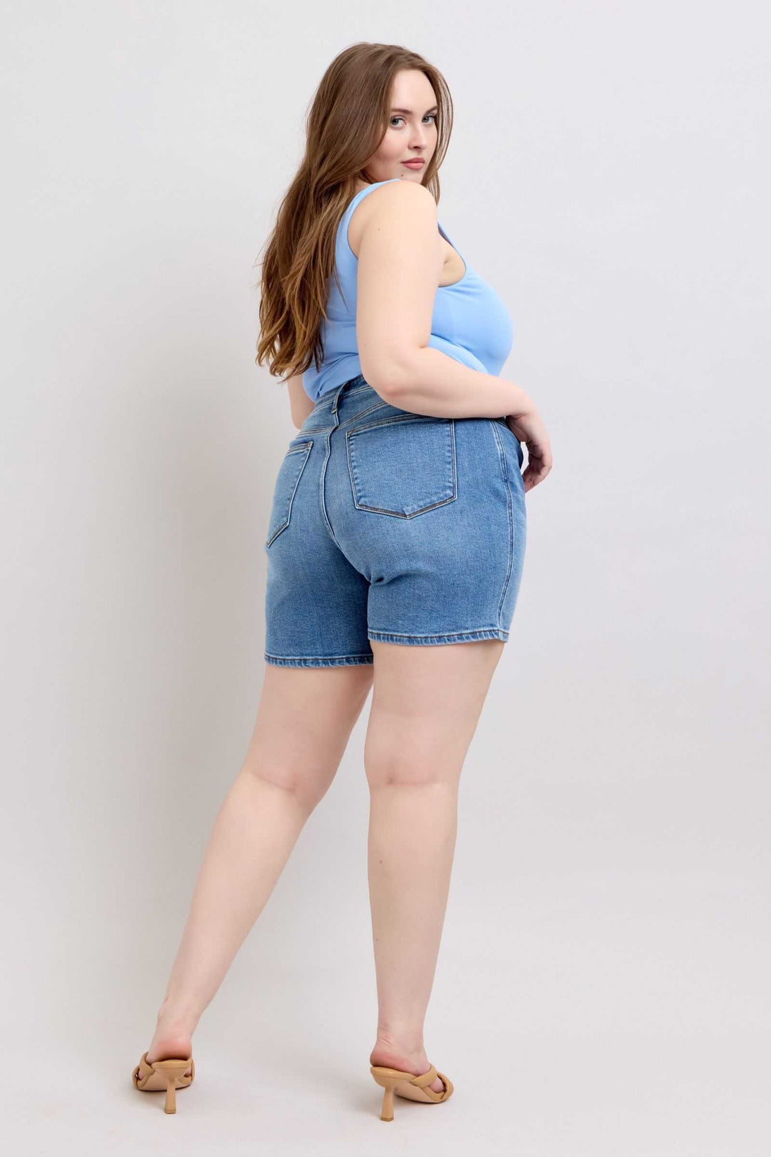 Judy Blue Two Button Denim ShortsElevate your casual look with our 2-button denim shorts featuring convenient pockets for on-the-go essentials. These shorts offer a stylish and comfortable fit, perfJean ShortsJudy Blue Two Button Denim Shorts