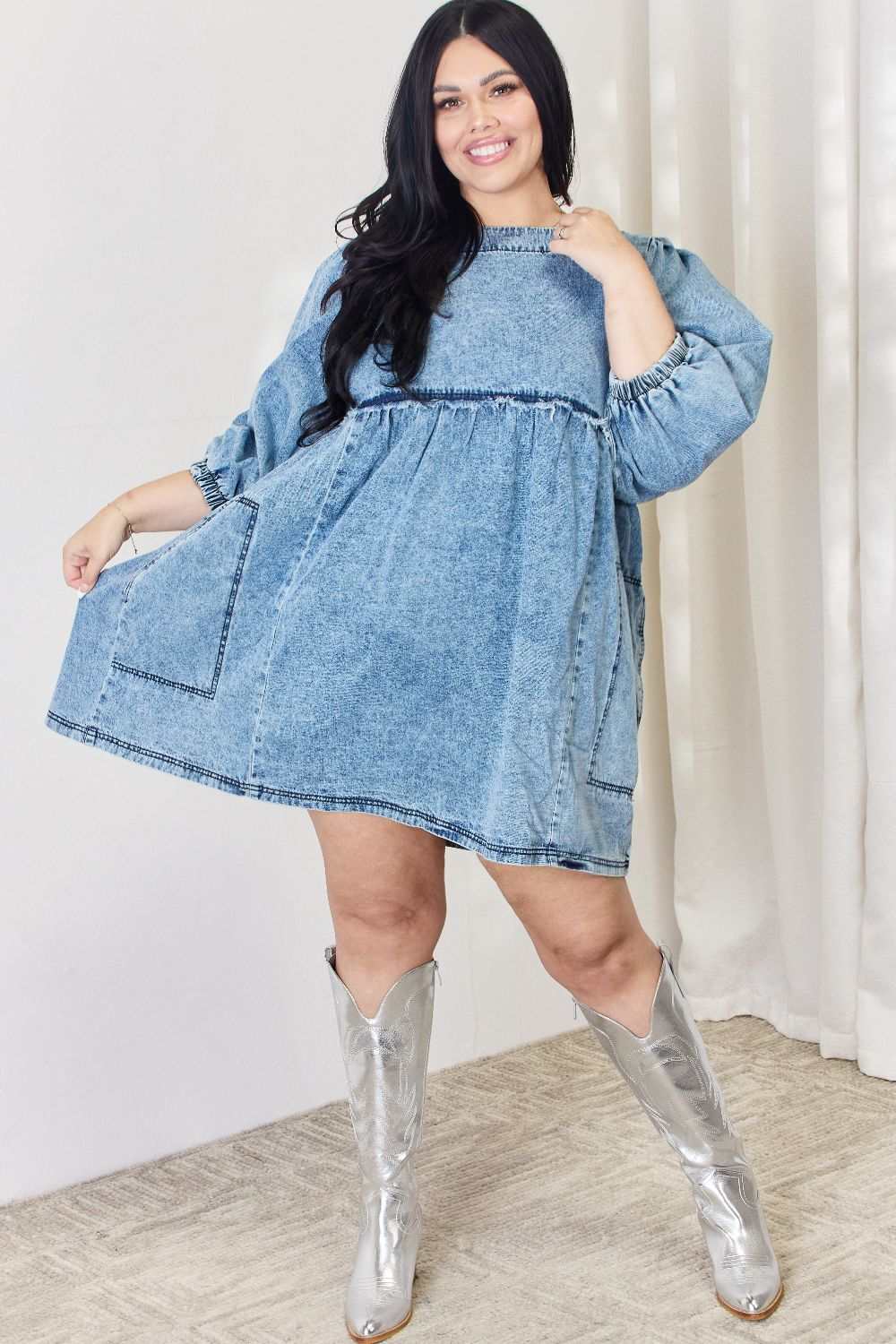 Oversized Denim Babydoll DressThis dress boasts a relaxed, oversized fit that flatters all body types. The babydoll silhouette adds a touch of playful femininity, while the balloon sleeves exude Mini DressesOversized Denim Babydoll Dress