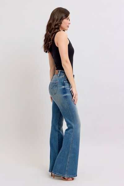 Judy Blue Flared Tummy Control Vintage Wash Flare JeansThese flared tummy control vintage wash jeans offer both style and functionality. The tummy control feature helps create a flattering and slimming silhouette. The viFlare JeansJudy Blue Flared Tummy Control