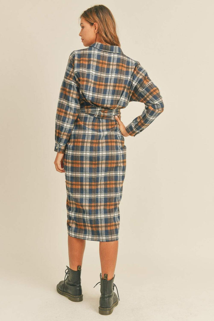 Plaid Flannel Shirt DressThis cotton and chenille shirt dress features a classic plaid flannel pattern in a versatile and stylish design. With a front tie detail, it adds a touch of femininiMidi DressesPlaid Flannel Shirt