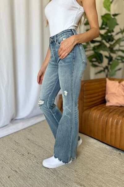 Judy Blue Medium Rise Tummy Control Destroyed FlareThe medium rise tummy control destroy flare jeans are designed to enhance your silhouette while providing ultimate comfort. Featuring a flattering fit, these jeans oFlare JeansJudy Blue Medium Rise