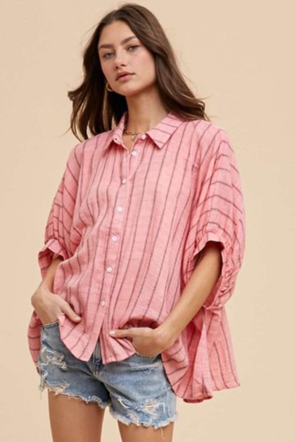 Desert Rose Oversized ShirtThe Desert Rose shirt is an airy, free-spirited take on classic shirting. Crafted from lightweight cotton with soft, sun-washed stripes, this oversized button-up bleButton-Up ShirtsDesert Rose