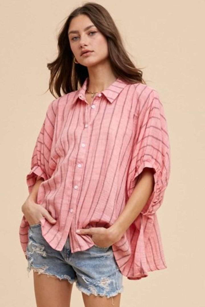 Desert Rose Oversized ShirtThe Desert Rose shirt is an airy, free-spirited take on classic shirting. Crafted from lightweight cotton with soft, sun-washed stripes, this oversized button-up bleButton-Up ShirtsDesert Rose
