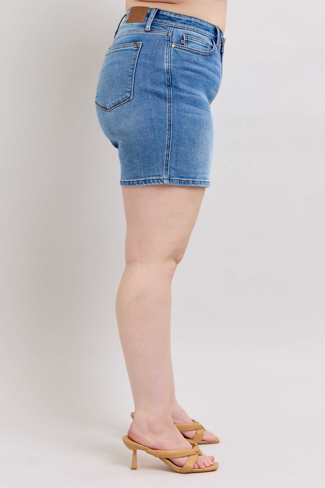 Judy Blue Two Button Denim ShortsElevate your casual look with our 2-button denim shorts featuring convenient pockets for on-the-go essentials. These shorts offer a stylish and comfortable fit, perfJean ShortsJudy Blue Two Button Denim Shorts