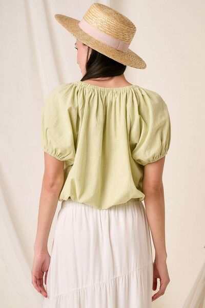 Cotton Two-Way Short Sleeve Cropped BlouseThe Cotton Two-Way Short Sleeve Crop Blouse is a versatile and chic piece that offers multiple styling options. Made from lightweight cotton fabric, this blouse is pShort Sleeve BlousesCotton Two-Way Short Sleeve