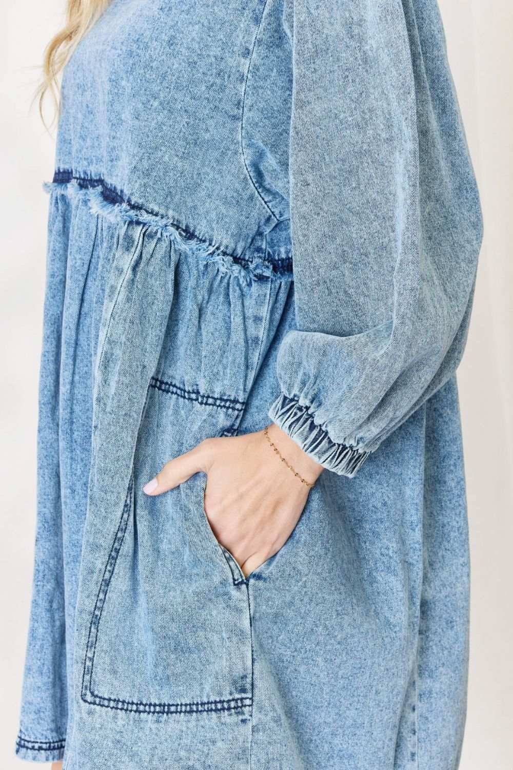 Oversized Denim Babydoll DressThis dress boasts a relaxed, oversized fit that flatters all body types. The babydoll silhouette adds a touch of playful femininity, while the balloon sleeves exude Mini DressesOversized Denim Babydoll Dress