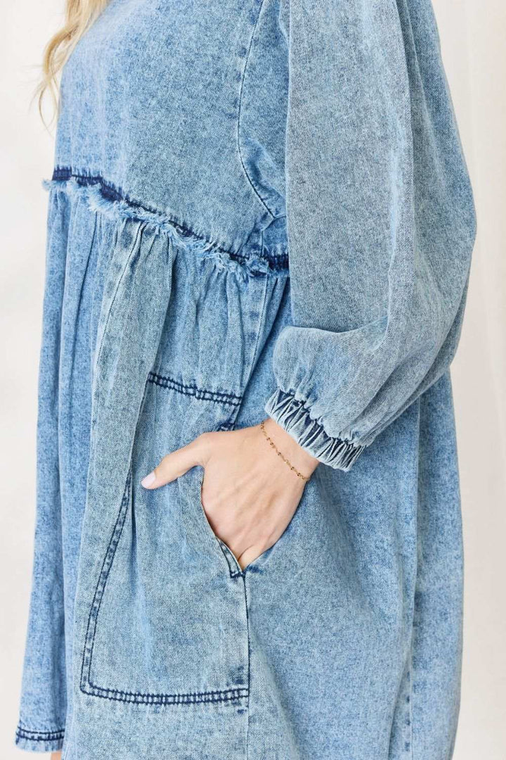 Oversized Denim Babydoll DressThis dress boasts a relaxed, oversized fit that flatters all body types. The babydoll silhouette adds a touch of playful femininity, while the balloon sleeves exude Mini DressesOversized Denim Babydoll Dress