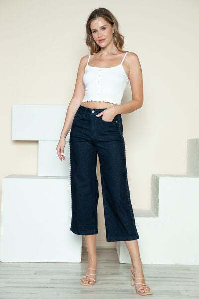 Judy Blue Side Seam Braid Detail Crop Wide Leg JeansThe High Rise side seam braid detail crop wide leg jeans offer a contemporary twist on classic denim. Featuring a unique braided detail along the side seams, these jCropped JeansJudy Blue Side Seam