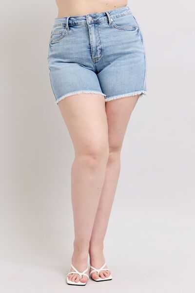 Judy Blue Tummy Control Raw Hem Denim ShortsThe tummy control raw hem denim shorts are designed to provide a slimming effect around the waist area while also featuring a trendy raw hem finish at the bottom. ThJean ShortsJudy Blue Tummy Control