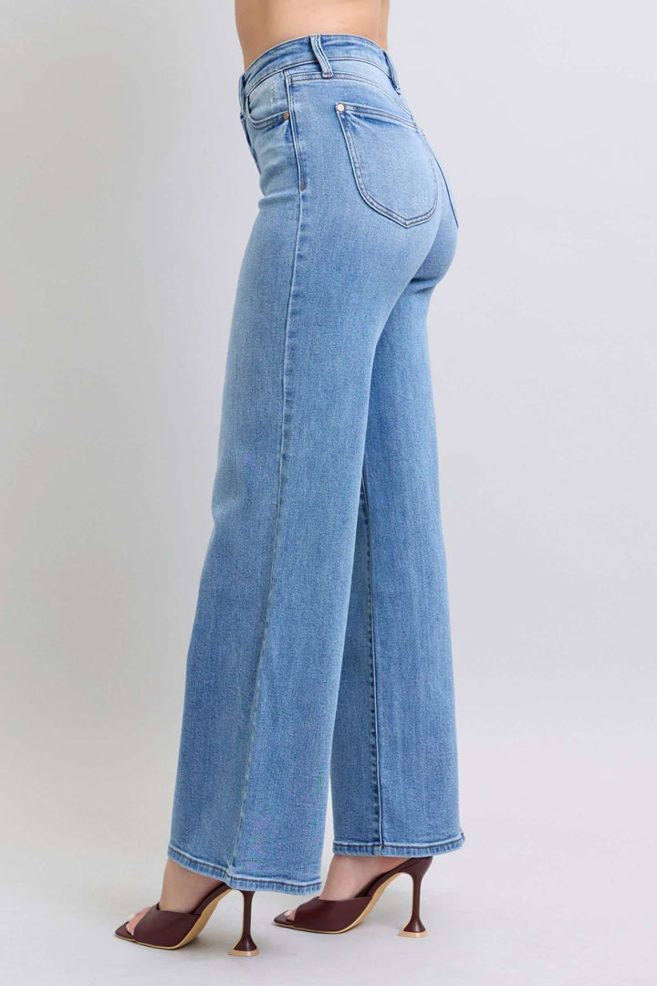 Judy Blue Wide Leg Jeans with PocketsWide Leg Jeans with Pockets are a trendy and versatile option for those looking to make a statement with their outfit. The wide-leg silhouette offers a relaxed and vWide Leg JeansJudy Blue Wide Leg Jeans
