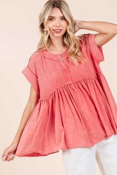 Mineral Wash Cotton Babydoll Short Sleeve BlouseThis relaxed fit tunic top is crafted from a unique 100% cotton waffle knit fabric with a mineral wash finish for a laid-back and stylish look. Featuring a flatterinShort Sleeve BlousesMineral Wash Cotton