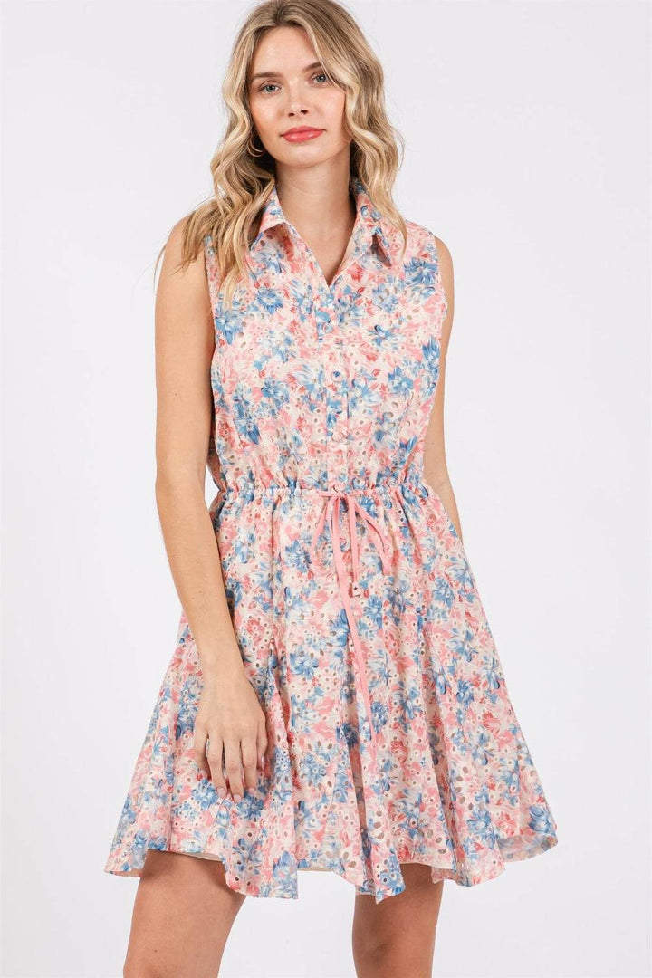 Floral Eyelet Sleeveless Mini DressThe Floral Eyelet Sleeveless Mini Dress is a charming and feminine choice for warm-weather occasions. Featuring delicate floral eyelet detailing, this dress exudes aMini DressesFloral Eyelet Sleeveless