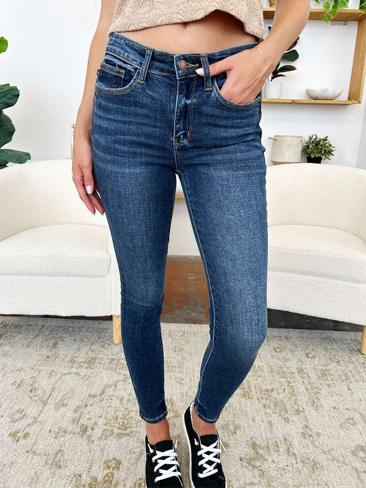 Judy Blue Classic Handsand Skinny JeansClassic Handsand Skinny Jeans combine timeless style with a trendy, hand-sanded finish for a versatile and fashion-forward look. The handsanding technique adds a touSkinny JeansJudy Blue Classic Handsand Skinny Jeans
