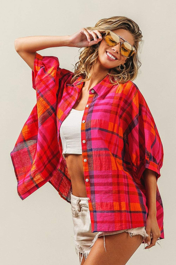 Linen Blend Dolman Sleeve Plaid ShirtThe Linen Blend Dolman Sleeve Plaid Shirt is a versatile and trendy wardrobe staple. This shirt features a classic plaid pattern that never goes out of style. The doButton-Up ShirtsLinen Blend Dolman Sleeve