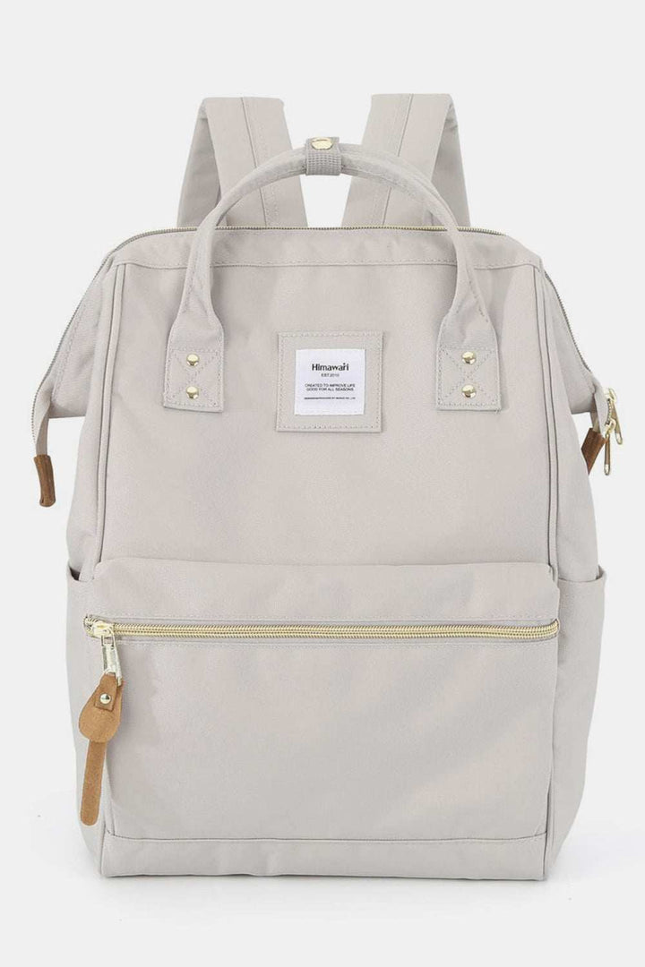 Himawari Waterproof Canvas Backpack Bag with Side PocketsIntroducing the upgraded version of the Holly, the Holly Daze backpack, now with a padded laptop compartment. This minimalist and classic Japanese-style backpack feaBackpackHimawari Waterproof Canvas Backpack