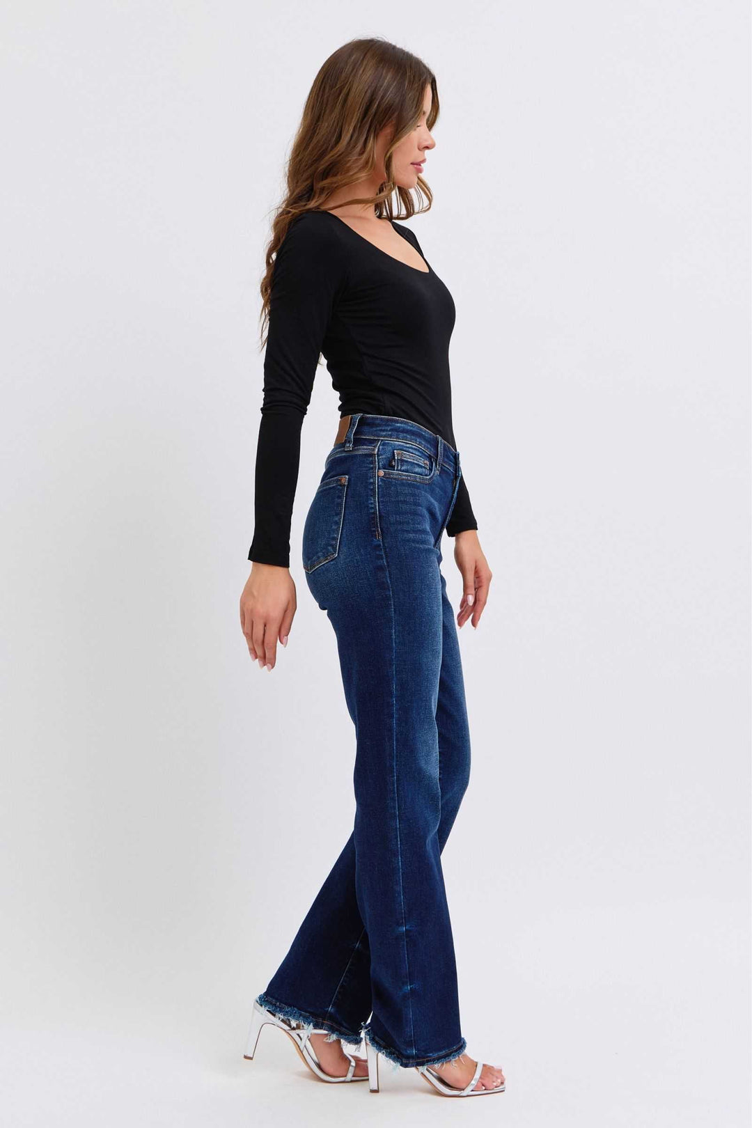 Judy Blue Raw Hem Straight Leg JeansRaw Hem Straight Leg Jeans are a versatile and timeless addition to your wardrobe. The raw hem adds a touch of edge, while the straight leg style offers a flatteringStraight Leg JeansJudy Blue Raw Hem