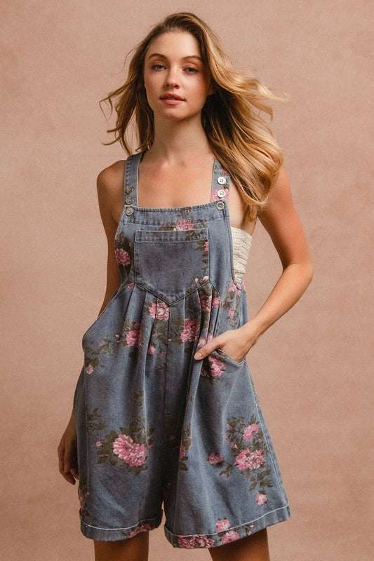 Heirloom Floral OverallsTimeless and effortlessly charming, The Heirloom Floral Overalls blend vintage elegance with casual ease. Crafted from sturdy yet soft cotton denim, these overalls fOverallsHeirloom Floral Overalls