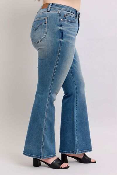 Judy Blue Flared Tummy Control Vintage Wash Flare JeansThese flared tummy control vintage wash jeans offer both style and functionality. The tummy control feature helps create a flattering and slimming silhouette. The viFlare JeansJudy Blue Flared Tummy Control