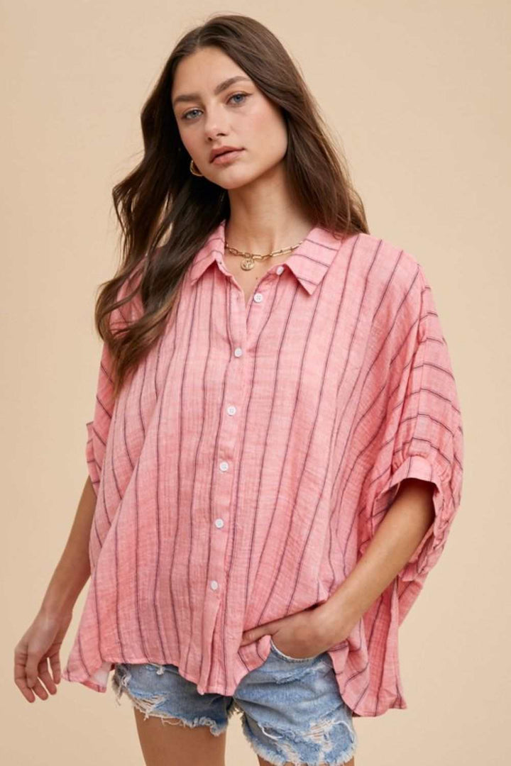 Desert Rose Oversized ShirtThe Desert Rose shirt is an airy, free-spirited take on classic shirting. Crafted from lightweight cotton with soft, sun-washed stripes, this oversized button-up bleButton-Up ShirtsDesert Rose