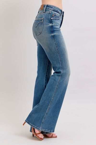 Judy Blue Flared Tummy Control Vintage Wash Flare JeansThese flared tummy control vintage wash jeans offer both style and functionality. The tummy control feature helps create a flattering and slimming silhouette. The viFlare JeansJudy Blue Flared Tummy Control