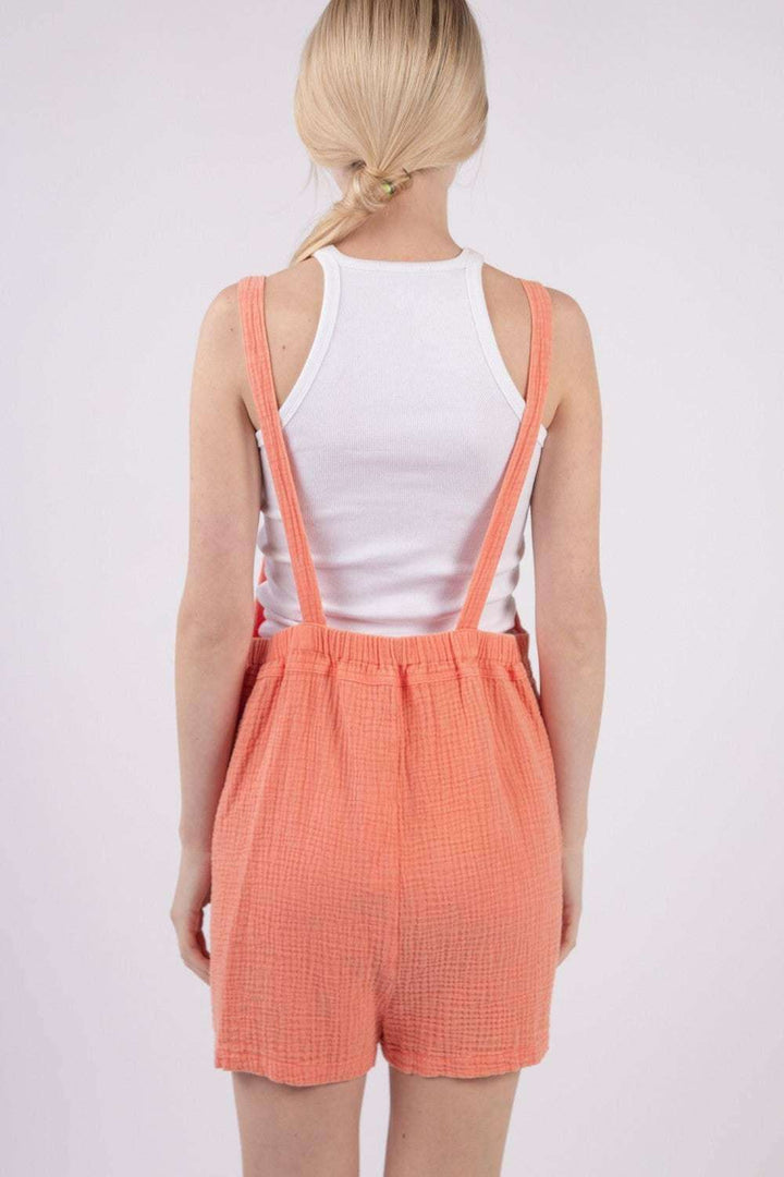 Sunny Coral Double Gauze Overall ShortsKeep cool and comfy with these overall shorts made from summer-friendly double gauze cotton. With a square neckline and open back, these overall shorts adds a stylisOverallsSunny Coral Double Gauze