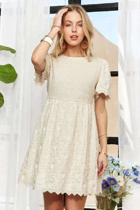 ADORA Rround Neck Crinkle Babydoll DressThe round neck crinkle babydoll dress is a charming and feminine option for any day. Its relaxed silhouette and crinkled texture add a playful touch to your outfit. ADORA Rround Neck