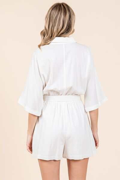 Tie Waist Linen Blend Half Sleeve RomperThe Tie Waist Linen Blend Half Sleeve Romper is a stylish and versatile one-piece outfit that exudes casual elegance. With a tie waist detail and half sleeves, this RompersTie Waist Linen Blend