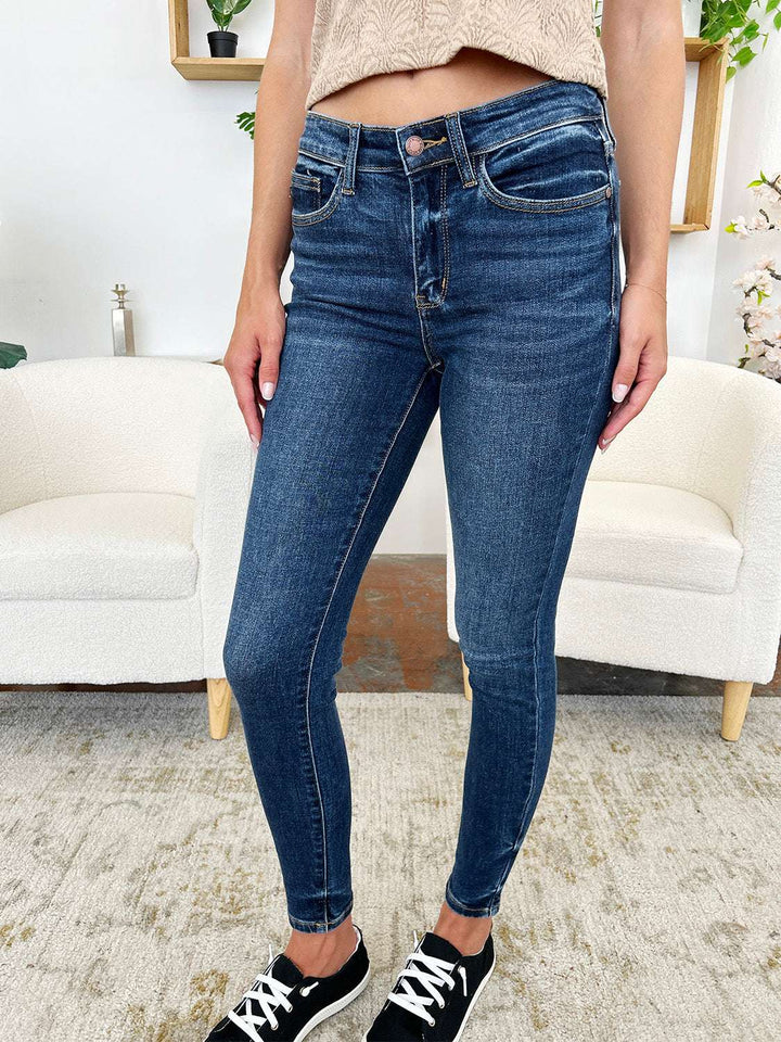 Judy Blue Classic Handsand Skinny JeansClassic Handsand Skinny Jeans combine timeless style with a trendy, hand-sanded finish for a versatile and fashion-forward look. The handsanding technique adds a touSkinny JeansJudy Blue Classic Handsand Skinny Jeans