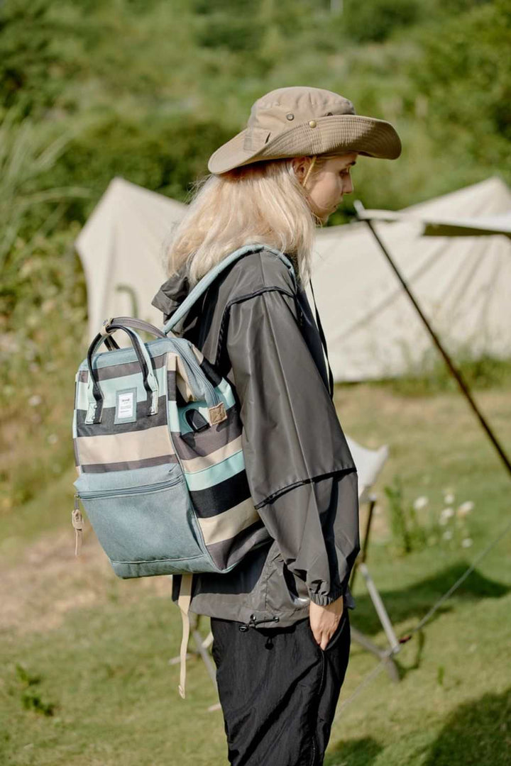 Himawari Striped Waterproof Nylon Backpack Bag with Side PocketsThe Striped Waterproof Nylon Backpack Bag with Side Pockets is a fashionable and functional accessory for any outing. Its stylish striped design adds a touch of flaiBackpackHimawari Striped Waterproof Nylon Backpack