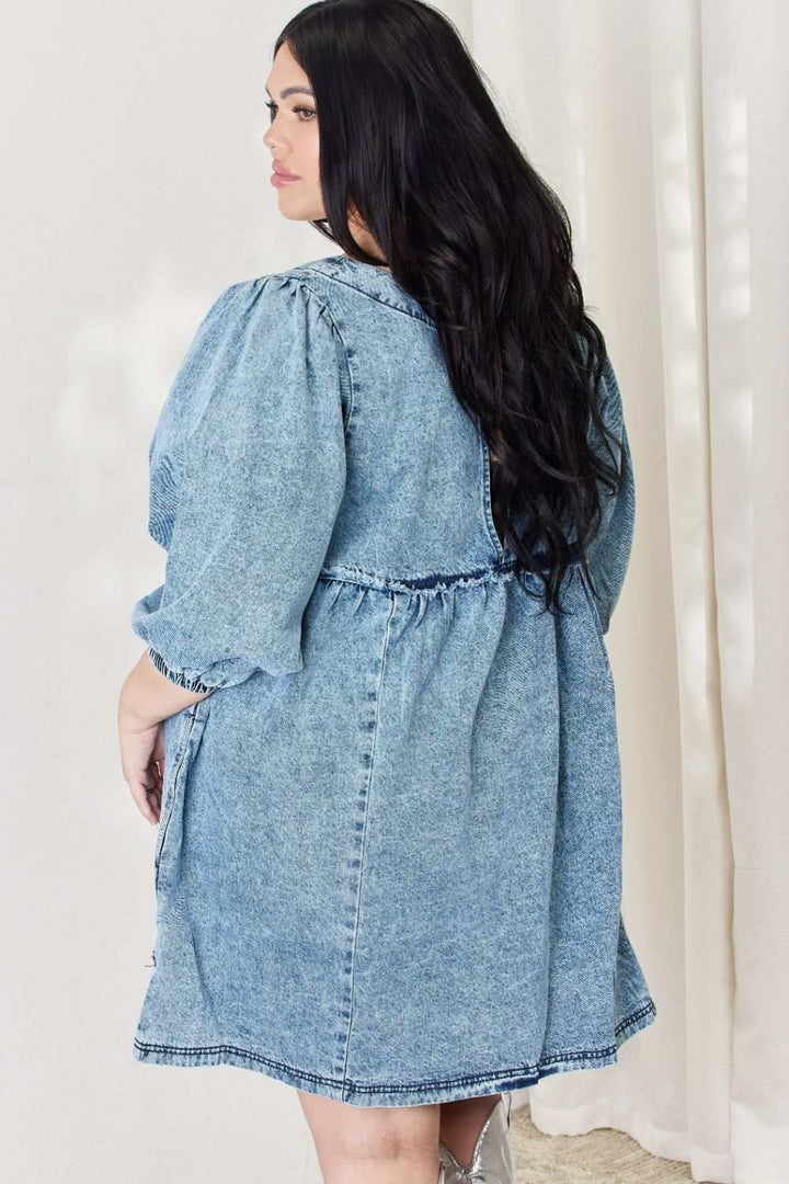 Oversized Denim Babydoll DressThis dress boasts a relaxed, oversized fit that flatters all body types. The babydoll silhouette adds a touch of playful femininity, while the balloon sleeves exude Mini DressesOversized Denim Babydoll Dress