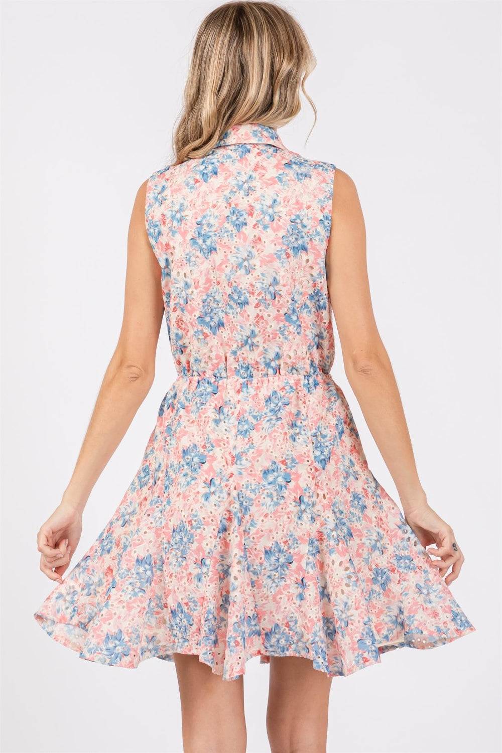 Floral Eyelet Sleeveless Mini DressThe Floral Eyelet Sleeveless Mini Dress is a charming and feminine choice for warm-weather occasions. Featuring delicate floral eyelet detailing, this dress exudes aMini DressesFloral Eyelet Sleeveless