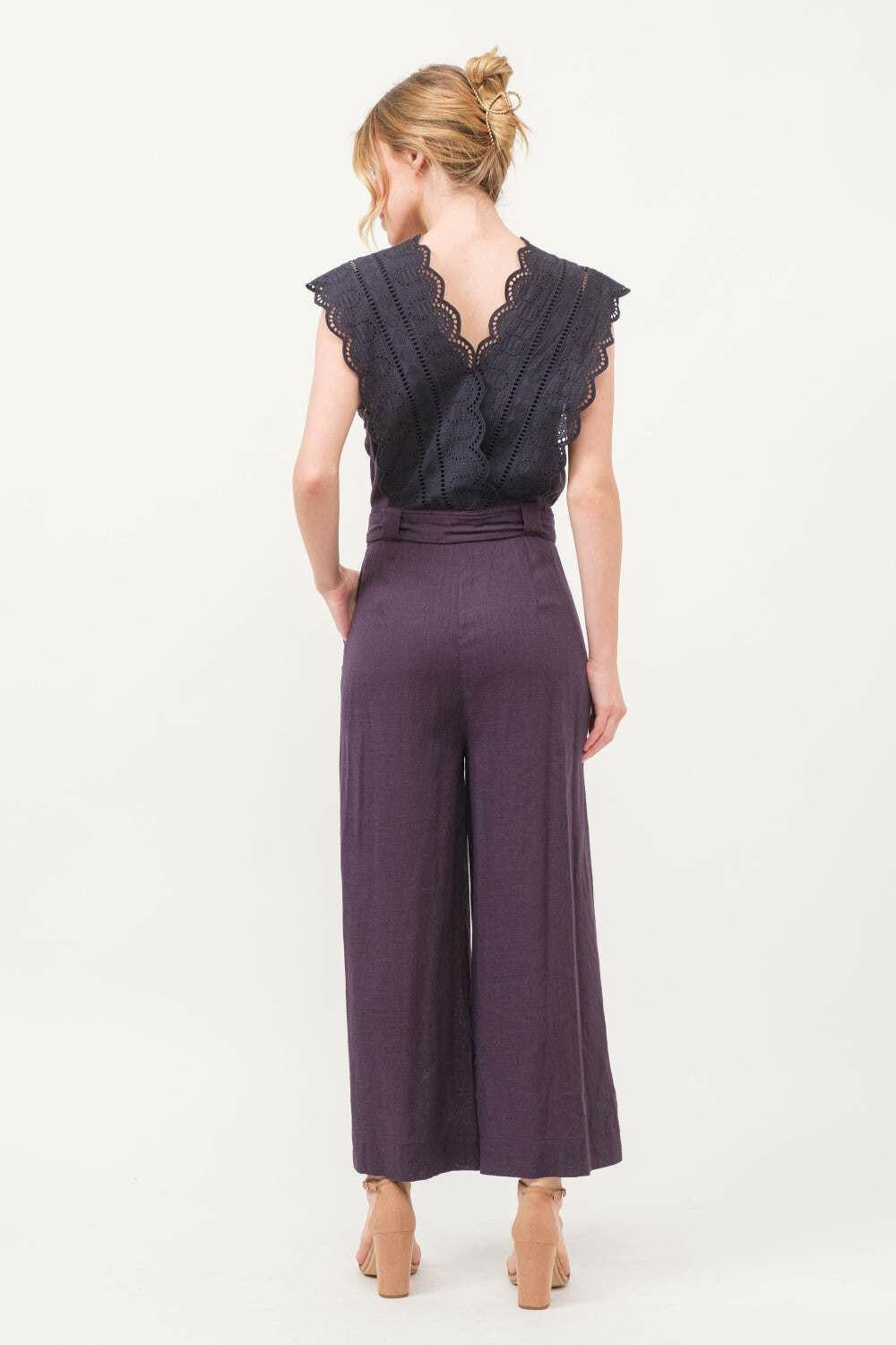 Plum Elegance Lace JumpsuitThe Plum Elegance Lace Jumpsuit is a chic and sophisticated piece that combines elegance with modern style. Featuring a laced surplice neckline and a flattering tie JumpsuitsPlum Elegance Lace Jumpsuit