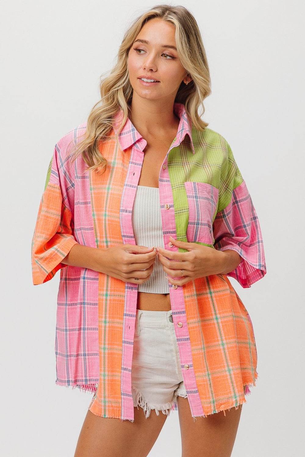 Plaid Collared Half Sleeve ShirtThe Plaid Collared Half Sleeve Shirt is a classic and timeless piece that combines the iconic plaid pattern with a smart collared neckline and trendy half sleeves. TButton-Up ShirtsPlaid Collared Half Sleeve Shirt