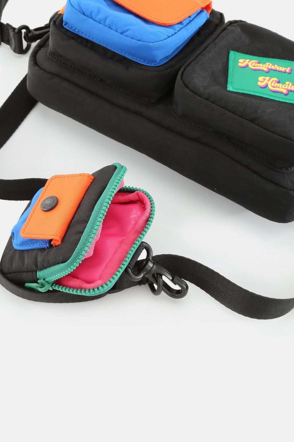 Himawari Removable Strap Nylon Crossbody Bag with EarPods BagThis versatile nylon crossbody bag comes with a removable strap for customization and convenience. It features a separate EarPods bag to keep your earphones organizeHandbagsHimawari Removable Strap