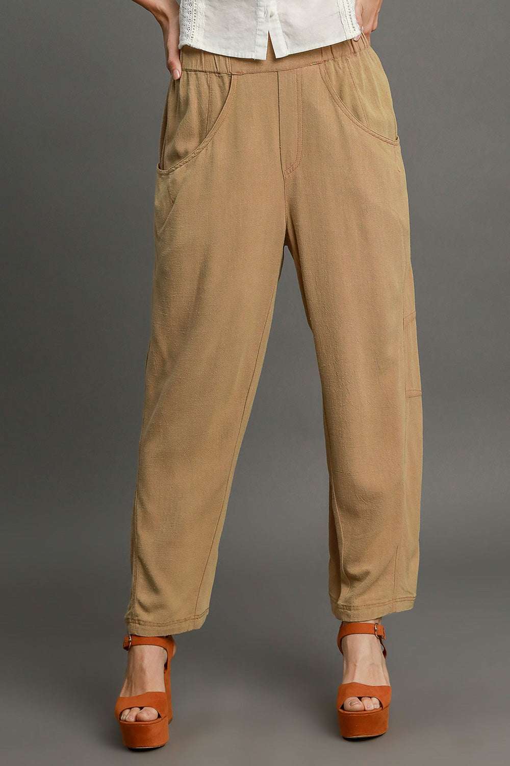 The Sandbar Linen Blend TrousersEasy, breathable, and softly structured — The [NAME] Trousers are crafted from a natural linen-cotton blend that moves effortlessly through warm days and cooler evenPantsSandbar Linen Blend