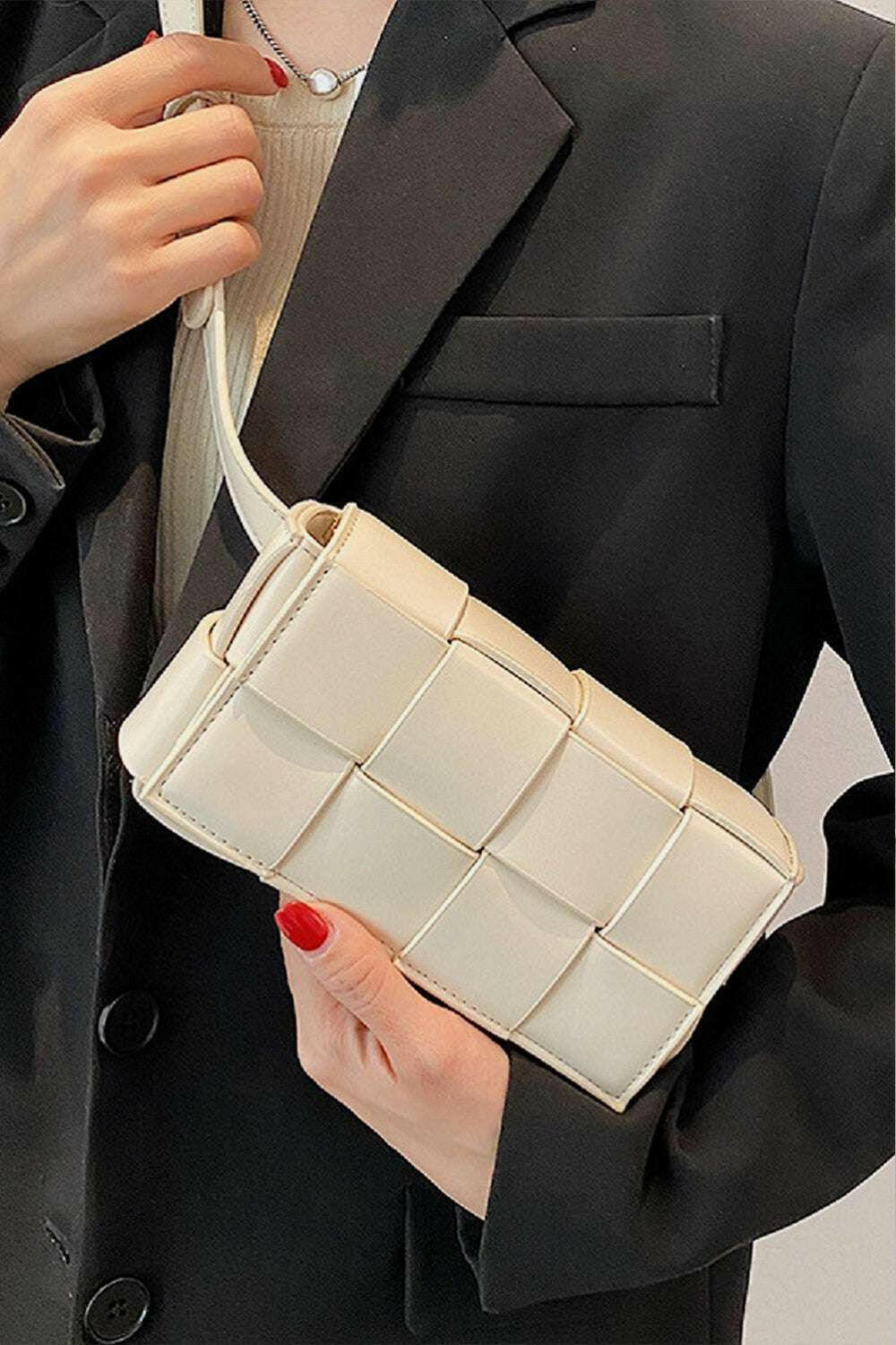 Woven Crossbody BagThis crossbody bag is the ultimate blend of style and practicality - ideal for any occasion, whether it's a casual day out or a fancy event, and will effortlessly elCrossbody BagsWoven Crossbody Bag