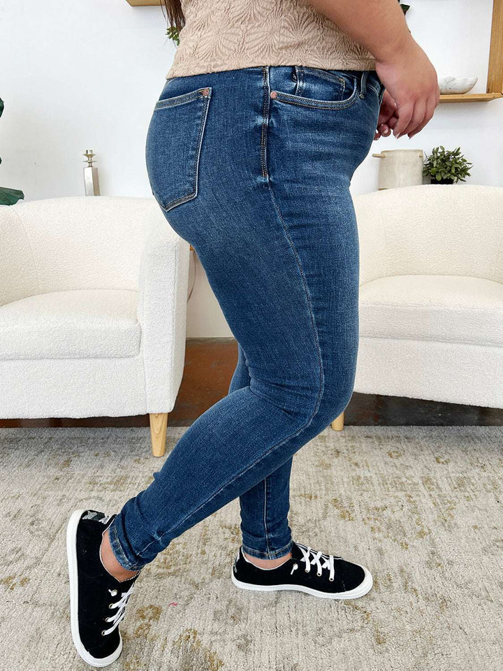 Judy Blue Classic Handsand Skinny JeansClassic Handsand Skinny Jeans combine timeless style with a trendy, hand-sanded finish for a versatile and fashion-forward look. The handsanding technique adds a touSkinny JeansJudy Blue Classic Handsand Skinny Jeans