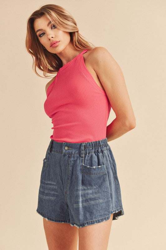 Ribbed Round Neck TankThe Ribbed Round Neck Tank is a classic and versatile piece that belongs in every wardrobe. Featuring a round neckline and ribbed texture, this tank top offers a timTank TopsRibbed Round Neck Tank