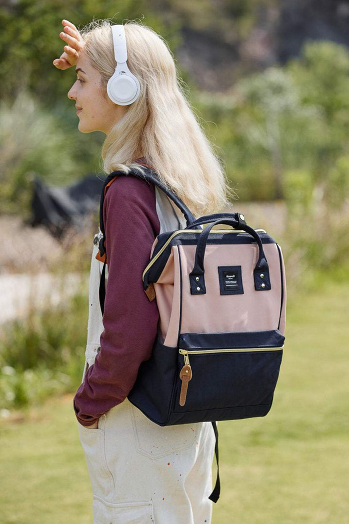 Himawari Waterproof Canvas Backpack Bag with Side PocketsIntroducing the upgraded version of the Holly, the Holly Daze backpack, now with a padded laptop compartment. This minimalist and classic Japanese-style backpack feaBackpackHimawari Waterproof Canvas Backpack