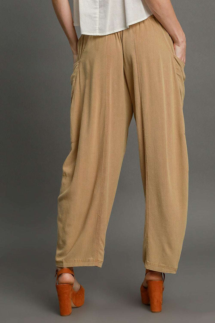 The Sandbar Linen Blend TrousersEasy, breathable, and softly structured — The [NAME] Trousers are crafted from a natural linen-cotton blend that moves effortlessly through warm days and cooler evenPantsSandbar Linen Blend