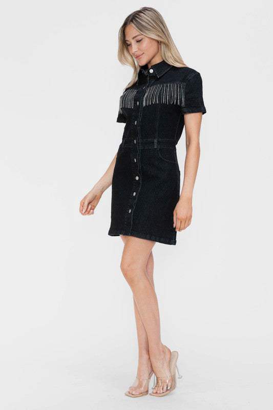 The Nashville Noir DressA little bit country, a little bit rock ‘n’ roll—the Nashville Noir Dress is where western edge meets modern glam. This sleek black denim shirt dress features a tailMini DressesNashville Noir Dress