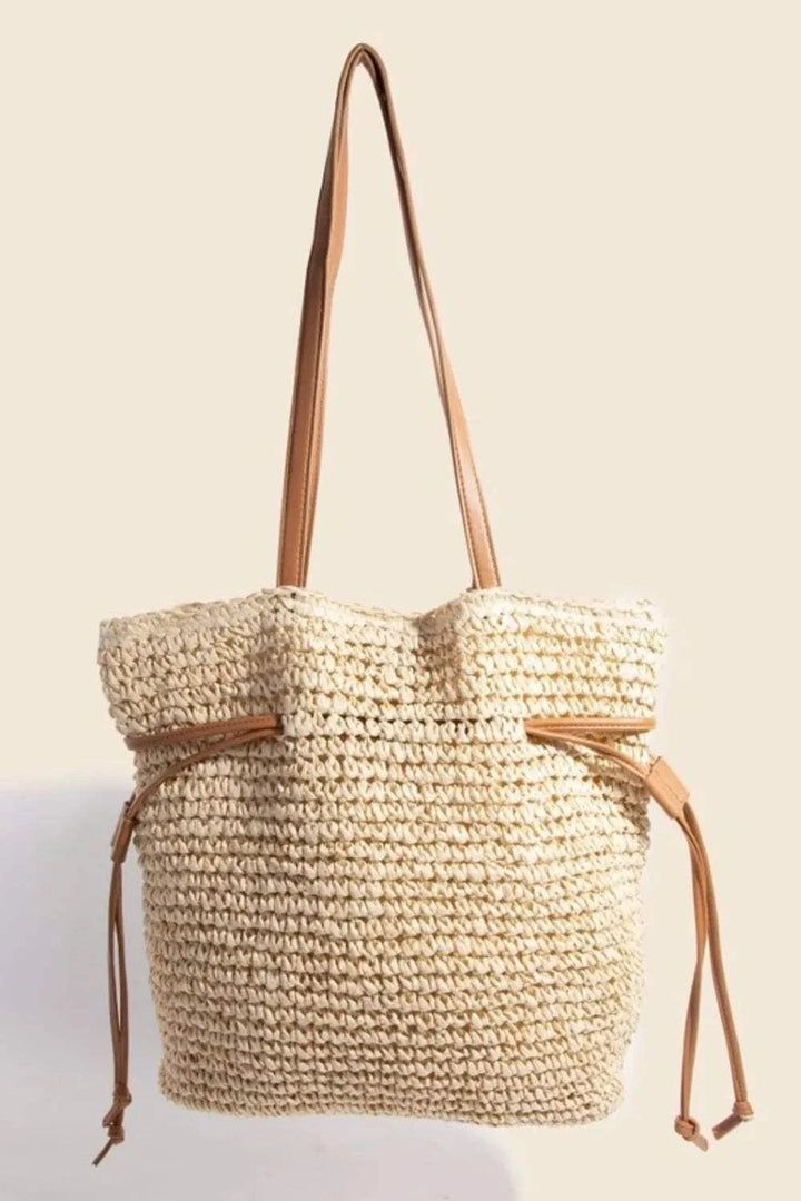Fame Faux Leather Straps Braided Tote BagThis faux leather straps braided tote bag is a sophisticated and stylish accessory that adds a touch of elegance to any ensemble. The combination of faux leather andTote BagsFame Faux Leather