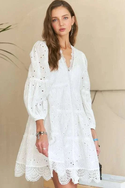 Lace Detail Tiered Eyelet V-Neck Babydoll DressA Lace Detail Tiered Eyelet V-Neck Babydoll Dress is a charming and elegant piece for your wardrobe. The V-neckline and babydoll silhouette offer a flattering and feMini DressesLace Detail Tiered